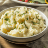 Creamy and fluffy Instant Pot mashed potatoes served in a bowl, a perfect side dish for any meal.