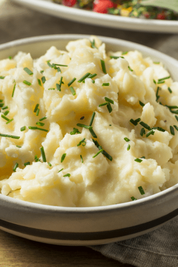 Creamy and fluffy Instant Pot mashed potatoes served in a bowl, a perfect side dish for any meal.