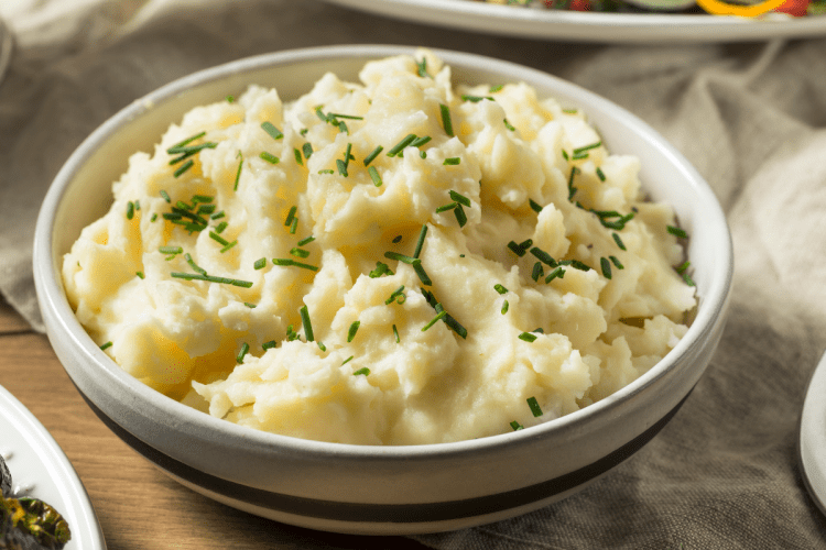 Creamy and fluffy Instant Pot mashed potatoes served in a bowl, a perfect side dish for any meal.